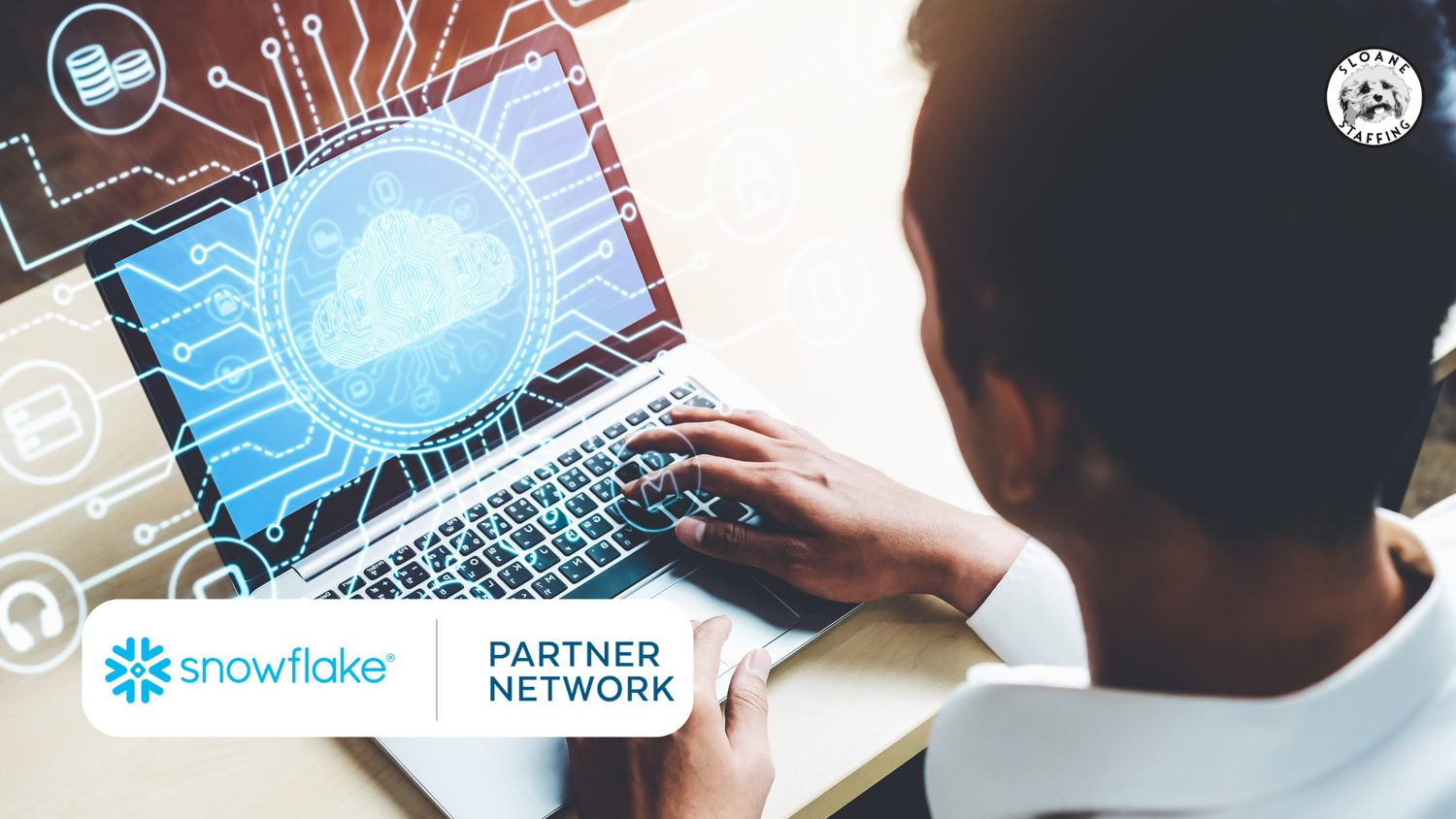 Man’s hands on a laptop with a cloud graphic on the screen; the Snowflake Partner Network logo is visible.